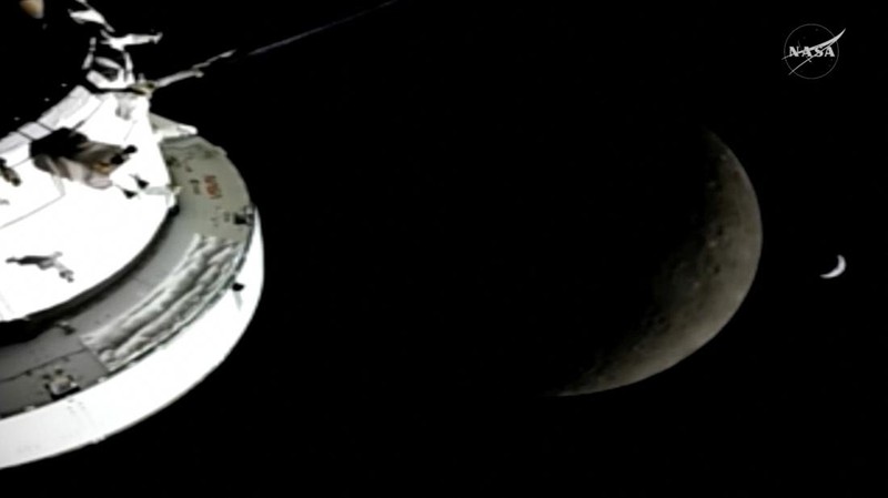 A view of the Moon and the Earth as the Artemis II mission's Orion spacecraft approaches to reach its furthest distance from Earth, in this screengrab taken from a livestream video on April 6, 2026. NASA/Handout via REUTERS    THIS IMAGE HAS BEEN SUPPLIED BY A THIRD PARTY.