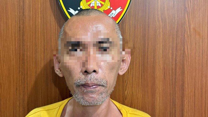 AS saat berada di kantor Satreskrim Polres Batu