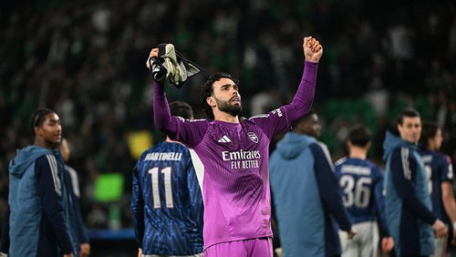 LISBON, PORTUGAL - APRIL 07: David Raya of Arsenal celebrates a goal during the UEFA Champions League 2025/26 Quarter-Final First Leg match between Sporting Clube de Portugal and Arsenal FC at Estadio Jose Alvalade on April 07, 2026 in Lisbon, Portugal. (Photo by Alex Juarez/Anadolu via Getty Images)