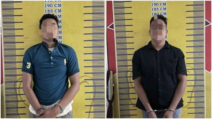 Fatah dan Sahru saat diamankan di kantor polisi.