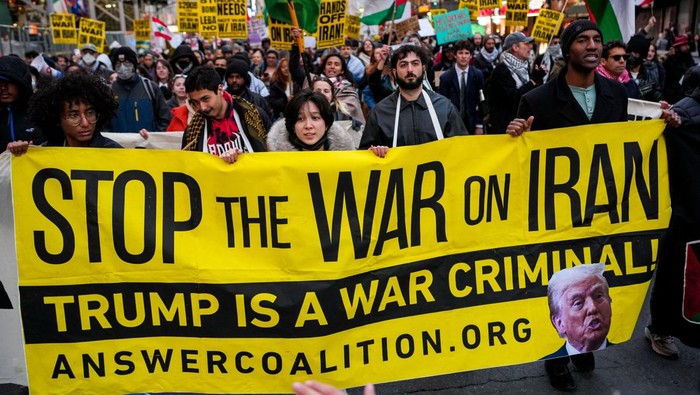 People march during a protest against the U.S.-Israeli conflict with Iran, and against conflict in Lebanon and Gaza, in New York City, U.S., April 8, 2026. REUTERS/Adam Gray