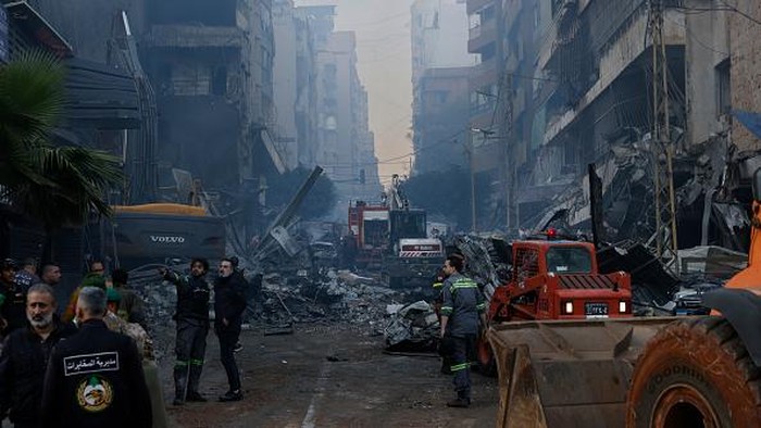 BEIRUT, LEBANON - APRIL 8: Rescue workers search for people after an Israeli attack hit a residential building in the Corniche al Mazraa neighborhood on April 8, 2026 in Beirut, Lebanon. Israel has stepped-up its attacks on Lebanon following Presiden