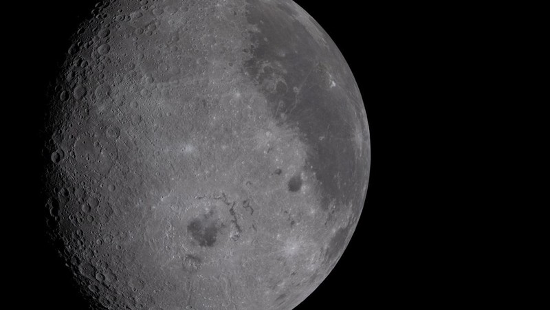 The NASA Artemis II crew, Mission Specialist Christina Koch, Mission Specialist Jeremy Hansen, Commander Reid Wiseman, and Pilot Victor Glover, pose for a group photo inside the Orion spacecraft on their way home following a flyby of the far side of the Moon on April 6, 2026. NASA/Handout via REUTERS THIS IMAGE HAS BEEN SUPPLIED BY A THIRD PARTY. REFILE - CORRECTING DATE FROM 