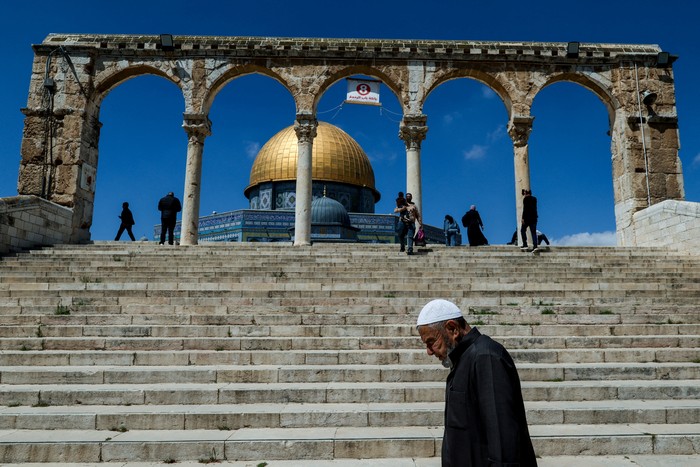 A man walks at the Al-Aqsa compound, known to Jews as the Temple Mount, on the day of Friday prayers, amid a two-week ceasefire in the Iran war, in Jerusalems Old City, April 10, 2026. REUTERS/Ammar Awad     TPX IMAGES OF THE DAY