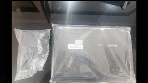 Barang bukti pencurian berupa satu unit laptop milik yayasan di Kuta, Badung. (dok. Polsek Kuta)