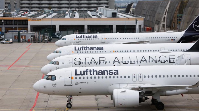 A person points at an information panel that shows flights, many of which are cancelled, during a strike by the UFO union, representing Lufthansa cabin crew, at Frankfurt Airport, Germany, April 10, 2026. REUTERS/Heiko Becker