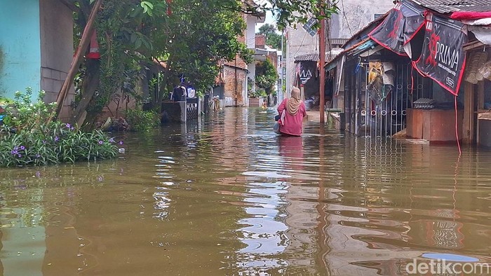 Kondisi banjir di Kampung Cijagra, Kecamatan Bojongsoang, Kabupaten Bandung, Minggu (12/4/2026).