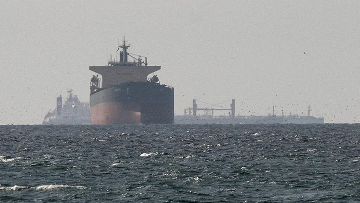 A vessel at the Strait of Hormuz, off the coast of Omans Musandam province, April 12, 2026. REUTERS
