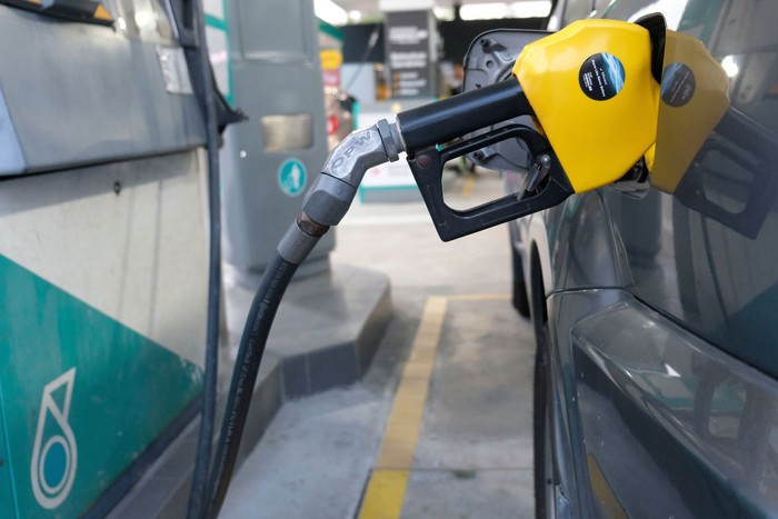 KUALA LUMPUR, KL, MALAYSIA - 2019/03/15: Gas nozzle seen while people filled up their petrol at a Petronas oil and gas station in Kuala Lumpur.

National Petroleum Limited or known as PETRONAS is a Malaysian oil and gas company founded on 17 August