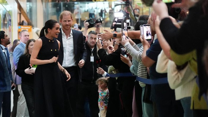 Pangeran Harry dan istrinya, Meghan Markle (Foto: Jonathan Brady/Pool via REUTERS)