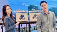 Meiza Aulia juga memperlihatkan foto lain bersama dengan Eza Gionino. Mereka kompak memakai atasan biru dan celana panjang hitam. (Foto: dok Instagram ma_coritha)