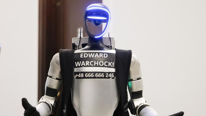 A humanoid robot named Edward WarchockI is seen during a visit in the Polish Parliament (Sejm) in Warsaw, Poland on March 25th, 2026. Edward Warchocki is Unitree G1 Robotic Humanoid which has taken the Polish internet by storm, with many of its video