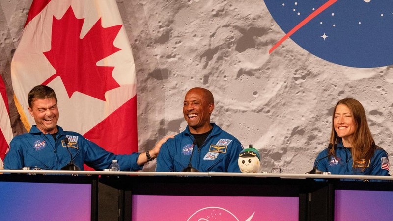 A plush moon sits on the table while the four-member crew of the Artemis II Moon mission's Orion capsule speak during a press conference at NASA's Johnson Space Centre in Houston, Texas, U.S., April 16, 2026.  REUTERS/Lexi Parra