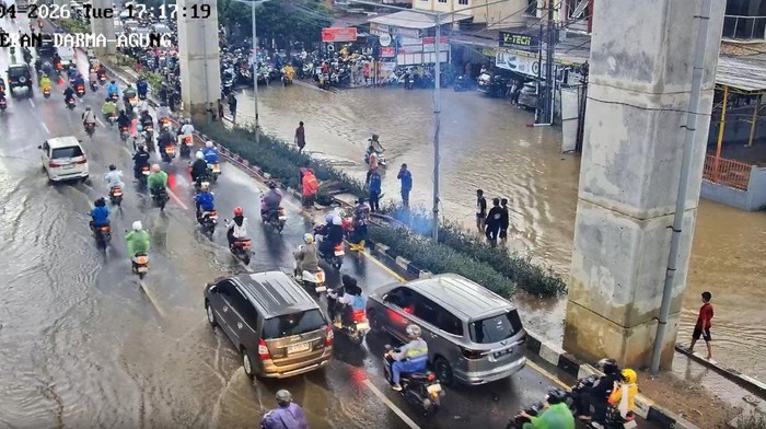 Banjir di salah satu di Kota Palembang setelah diguyur hujan deras