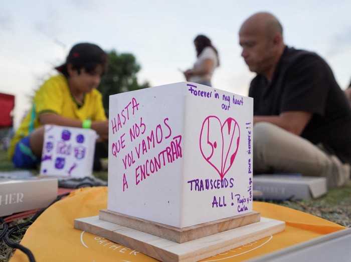 Paper lanterns with handwritten messages float on Lake Acitlalin during the “Water Lantern Festival,” at the Xochimilco Ecological Park in Mexico City, Mexico, April 18, 2026. REUTERS/Alicia Fernandez