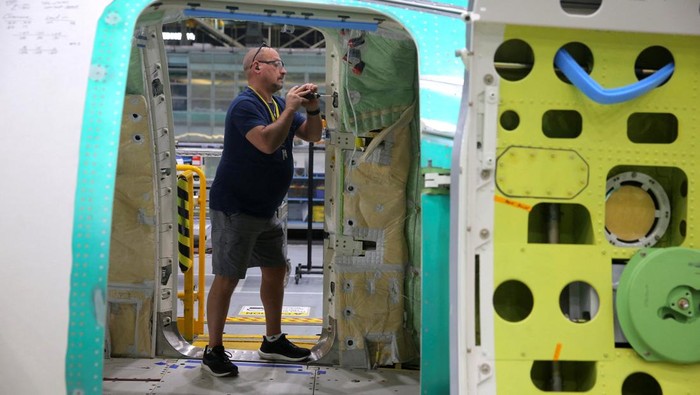 A 737 MAX airplane is seen on the final assembly production line during a media tour of the Boeing factory in Renton, Washington, U.S., April 15, 2026.   REUTERS/Genna Martin
