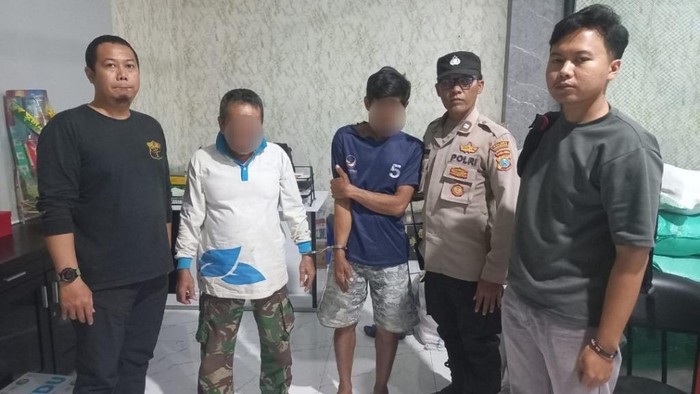 Pelaku saat diamankan polisi