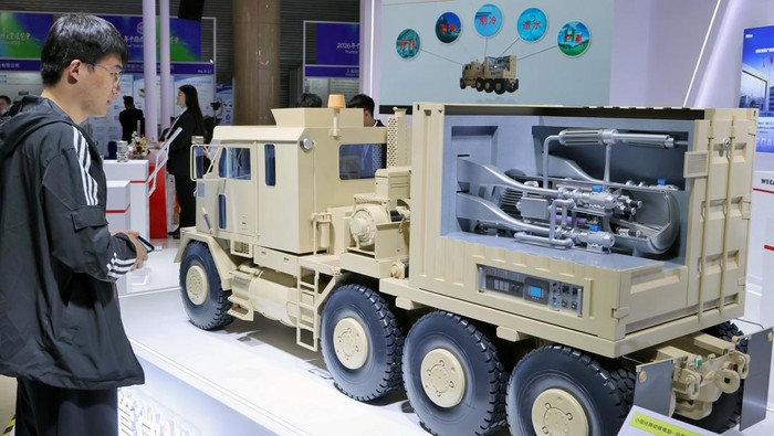 BEIJING, CHINA - APRIL 22, 2026 - Visitors learn about intelligent equipment in the field of nuclear energy at the 2026 China International Nuclear Industry Exhibition in Beijing, China on April 22, 2026. (Photo credit should read CFOTO/Future Publishing via Getty Images)