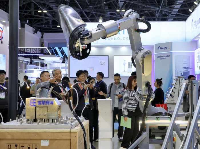 BEIJING, CHINA - APRIL 22, 2026 - Visitors learn about intelligent equipment in the field of nuclear energy at the 2026 China International Nuclear Industry Exhibition in Beijing, China on April 22, 2026. (Photo credit should read CFOTO/Future Publishing via Getty Images)