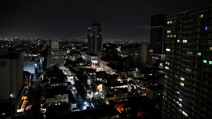 Buildings and street lights illuminate the night as Cubans this week began to reap the benefits of a recent 100,000 metric ton delivery of Russian oil, a temporary lifeline for the energy-starved nation and the first major shipment of oil to the island since the United States moved to cut off its fuel early this year, in Havana, Cuba April 23, 2026. REUTERS/Norlys Perez