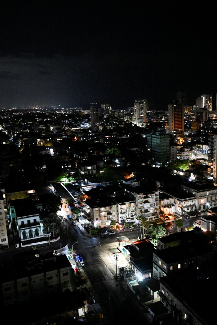 Buildings and street lights illuminate the night as Cubans this week began to reap the benefits of a recent 100,000 metric ton delivery of Russian oil, a temporary lifeline for the energy-starved nation and the first major shipment of oil to the island since the United States moved to cut off its fuel early this year, in Havana, Cuba April 23, 2026. REUTERS/Norlys Perez