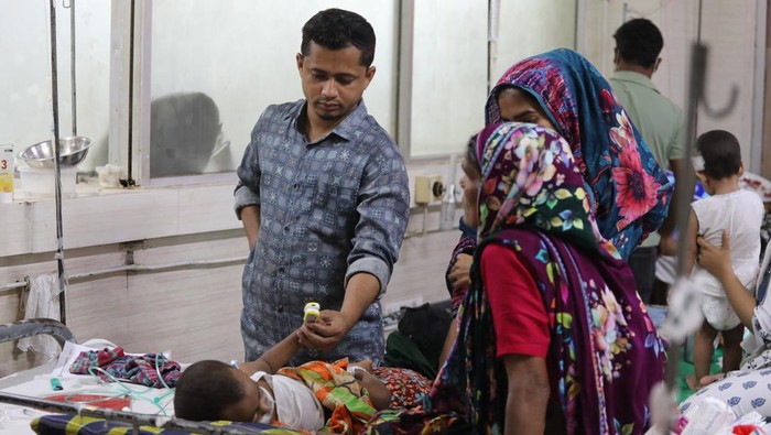 Children receive treatment at a hospital in Dhaka, Bangladesh, in April 2026, amid a growing measles outbreak. The number of infections and deaths continues to rise across the country, placing increasing pressure on healthcare facilities. (Photo by Sony Ramani/NurPhoto via Getty Images)