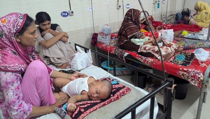 Children receive treatment at a hospital in Dhaka, Bangladesh, in April 2026, amid a growing measles outbreak. The number of infections and deaths continues to rise across the country, placing increasing pressure on healthcare facilities. (Photo by Sony Ramani/NurPhoto via Getty Images)