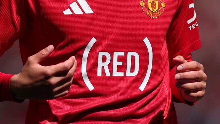 MANCHESTER, ENGLAND - MAY 11: Detail of RED special-edition shirt sponsor branding during the Premier League match between Manchester United FC and West Ham United FC at Old Trafford on May 11, 2025 in Manchester, England. (Photo by Marc Atkins/Getty Images)
