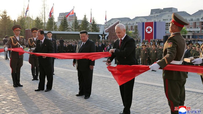 North Korean leader Kim Jong Un joins Russia's Defence Minister Andrey Belousov as he inaugurates the Memorial Museum of Combat Feats at the Overseas Military Operations honouring North Korean troops killed while fighting for Russia in the war against Ukraine, in Pyongyang, North Korea, April 26, 2026, in this picture released by North Korea's official Korean Central News Agency. KCNA via REUTERS    ATTENTION EDITORS - THIS IMAGE WAS PROVIDED BY A THIRD PARTY. REUTERS IS UNABLE TO INDEPENDENTLY VERIFY THIS IMAGE. NO THIRD PARTY SALES. SOUTH KOREA OUT. NO COMMERCIAL OR EDITORIAL SALES IN SOUTH KOREA.