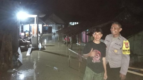 Salah satu titik banjir yang terjadi di wilayah Desa Candikusuma, Kecamatan Melaya, Kabupaten Jembrana, Senin (27/4/2026).