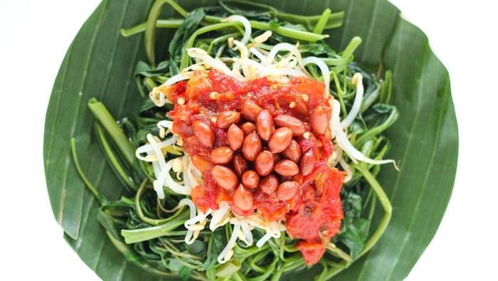 Plecing kangkung. Spicy boiled water spinach.