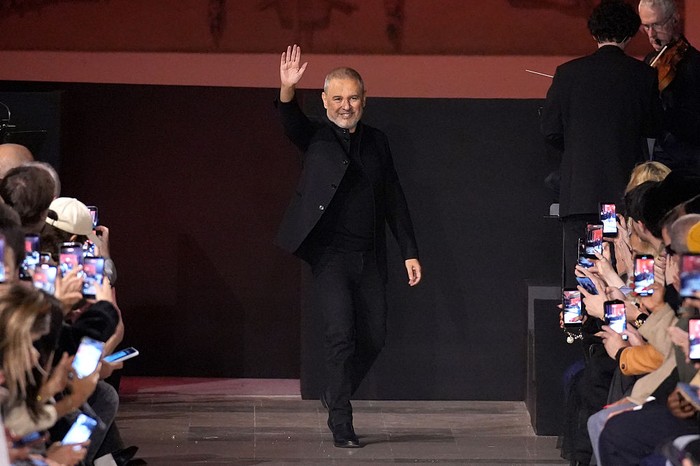 PARIS, FRANCE - JANUARY 28: (EDITORIAL USE ONLY - For Non-Editorial use please seek approval from Fashion House) Designer Elie Saab acknowledges the applause of the audience after his Haute Couture Week Spring/Summer 2026 show as part of Paris Fashion Week on January 28, 2026 in Paris, France. (Photo by Francois Durand/Getty Images)