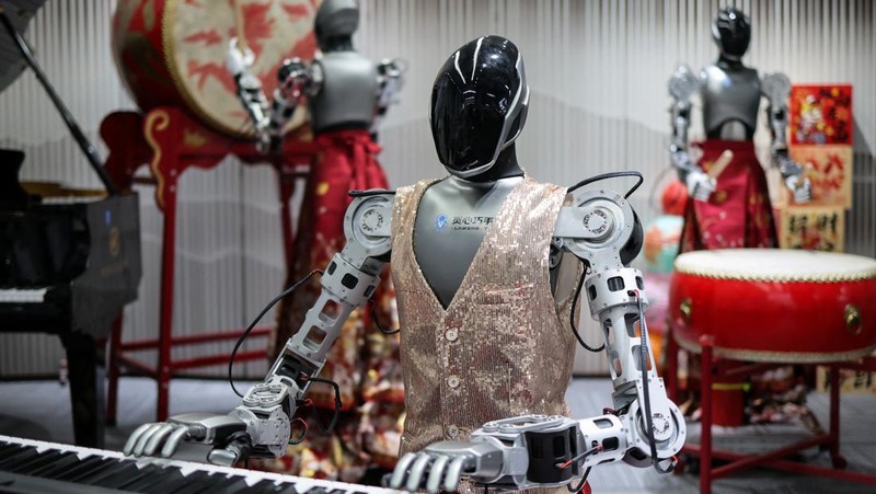 An ensemble of humanoid robots produced by Linkerbot is set up with musical instruments at the company’s office in Beijing, China, April 27, 2026. REUTERS/Maxim Shemetov