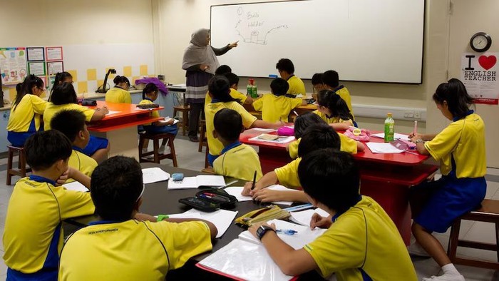 Langkah-langkah anti-perundungan standar baru telah diterapkan di seluruh sekolah di Singapura. (AP Photo/Ray Chua)