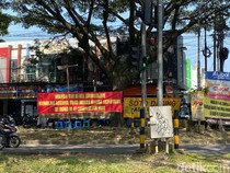 Banner Penolakan Toko Miras Muncul di Sawojajar Malang