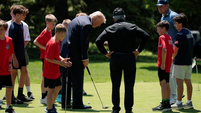 U.S. President Donald Trump watches fitness demonstrations during an event held for National Youth Sports and Fitness Month, on the South Lawn of the White House in Washington, D.C., U.S., May 5, 2026. REUTERS/Evan Vucci