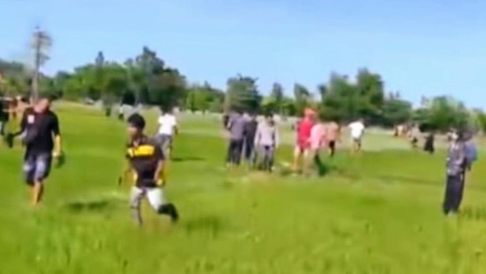 Pelaku saat berlarian ke area sawah