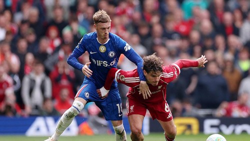 LIVERPOOL, ENGLAND - MAY 09: Cole Palmer of Chelsea battles for possession with Milos Kerkez of Liverpool during the Premier League match between Liverpool and Chelsea at Anfield on May 09, 2026 in Liverpool, England. (Photo by Chelsea Football Club/Chelsea FC via Getty Images)