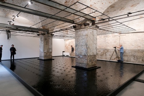 VENICE, ITALY - MAY 08: (EDITORIAL USE ONLY) Visitors explore the Romania Pavilion at Giardini during a press preview for the 61st International Art Exhibition - La Biennale di Venezia on May 08, 2026 in Venice, Italy. Titled Black Seas, Scores for the Sonic Eye, the Romania Pavilion presents a large-scale polyphonic installation of moving image, spatialized sound, and sculptural structures by Vienna and Bucharest-based artist duo Anca Benera and Arnold Estefán, curated by Corina Oprea and Diana Marincu, commissioned by the Romanian Ministry of Culture, Ministry of Foreign Affairs, and Romanian Cultural Institute. The 61st International Art Exhibition - La Biennale di Venezia, titled In Minor Keys and conceived by the late curator Koyo Kouoh, runs from May 9 to November 22, 2026, at the Giardini, the Arsenale, and venues throughout Venice. (Photo by Simone Padovani/Getty Images)