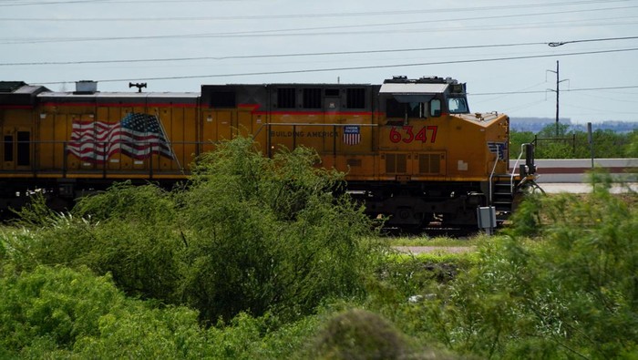 A Union Pacific train comes out of the Union Pacific Railroad Port Yard, a day after six bodies were found in a train in Laredo, Texas, U.S. May 11, 2026.  REUTERS/Gabriel V. Cardenas