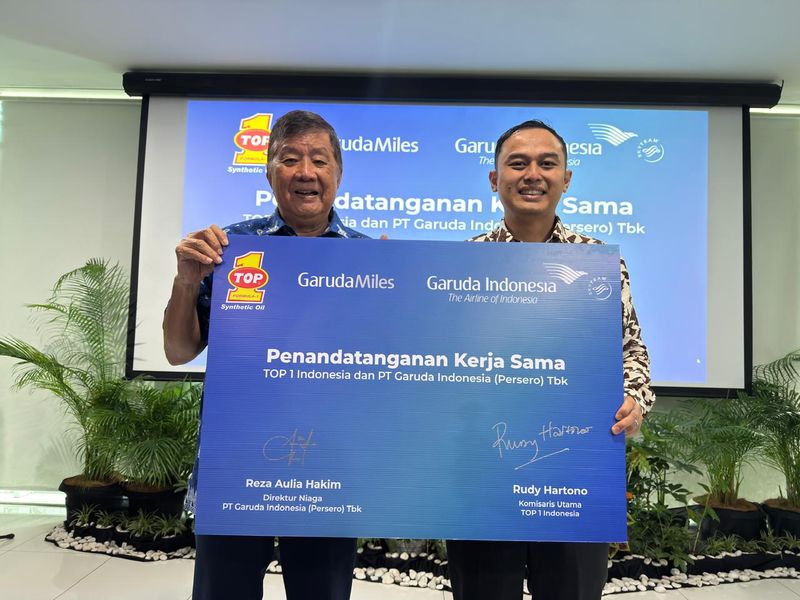 perluasan ekosistem loyalitas GarudaMiles bersama TOP 1.