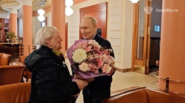 Russian President Vladimir Putin meets his former school teacher Vera Gurevich at a hotel in Moscow, Russia, in this still image from video released on May 11, 2026. Kremlin.ru/Handout via REUTERS ATTENTION EDITORS - THIS IMAGE WAS PROVIDED BY A THIR