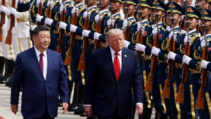 BEIJING, CHINA - MAY 14: U.S. President Donald Trump arrives for a state banquet hosted by Chinese President Xi Jinping at the Great Hall of the People on May 14, 2026 in Beijing, China. Both President Trump and President Xi addressed ways to enhance