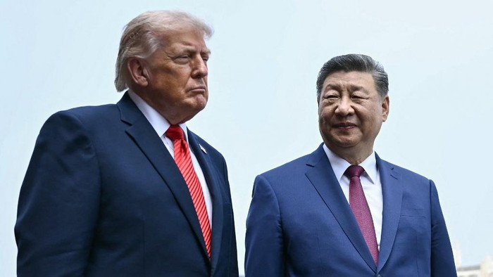 Chinas President Xi Jinping (R) and US President Donald Trump visit the Temple of Heaven in Beijing on May 14, 2026. Xi warned Trump that the issue of Taiwan could push their two countries into conflict if mishandled, a stark opening salvo as a su