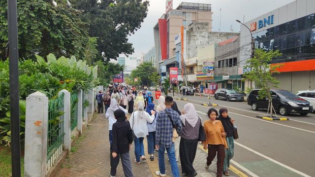 Suasana Blok M Jakarta saat libur panjang atau long weekend.