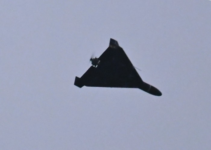 A photograph taken on December 27, 2025, shows an Iranian-designed Shahed 136 (Geranium-2) drone used by the Russian Army flying over Kyiv during a Russian drone and missile attack, amid the Russian invasion in Ukraine. (Sergei Supinsky/AFP)