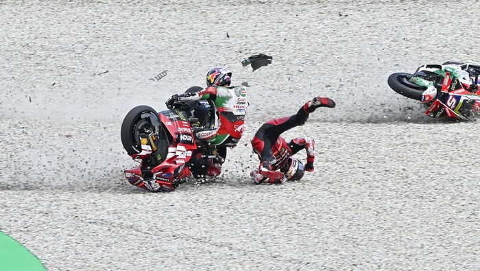 BARCELONA, SPAIN - MAY 17: Johann Zarco of France riding the LCR Honda (05) has his leg trapped in Francesco Bagnaias Ducati on the second restart during the MotoGP of Catalonia at Circuit de Barcelona-Catalunya on May 17, 2026 in Barcelona, Spain. 