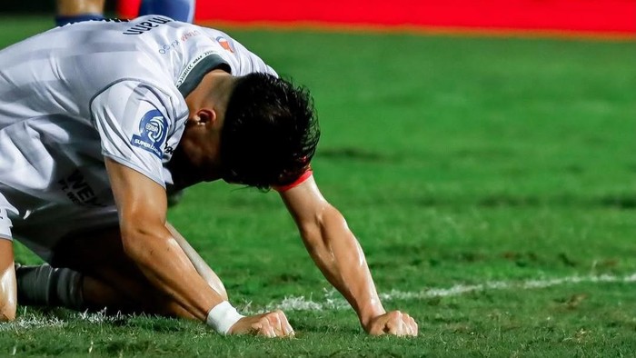 Penggawa Madura United tertunduk pada laga kontra PSIM