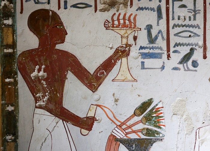 A visitor takes a photo inside the recently restored ancient 