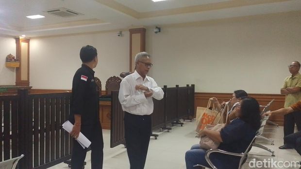 I Wayan Suaba dan I Gede Suteja Winatha saat menjalani sidang vonis kasus korupsi BUMDes Kerta Laba, Selasa, (19/5/2026). I Wayan Suaba dan I Gede Suteja Winatha saat menjalani sidang vonis kasus korupsi BUMDes Kerta Laba, Selasa, (19/5/2026).